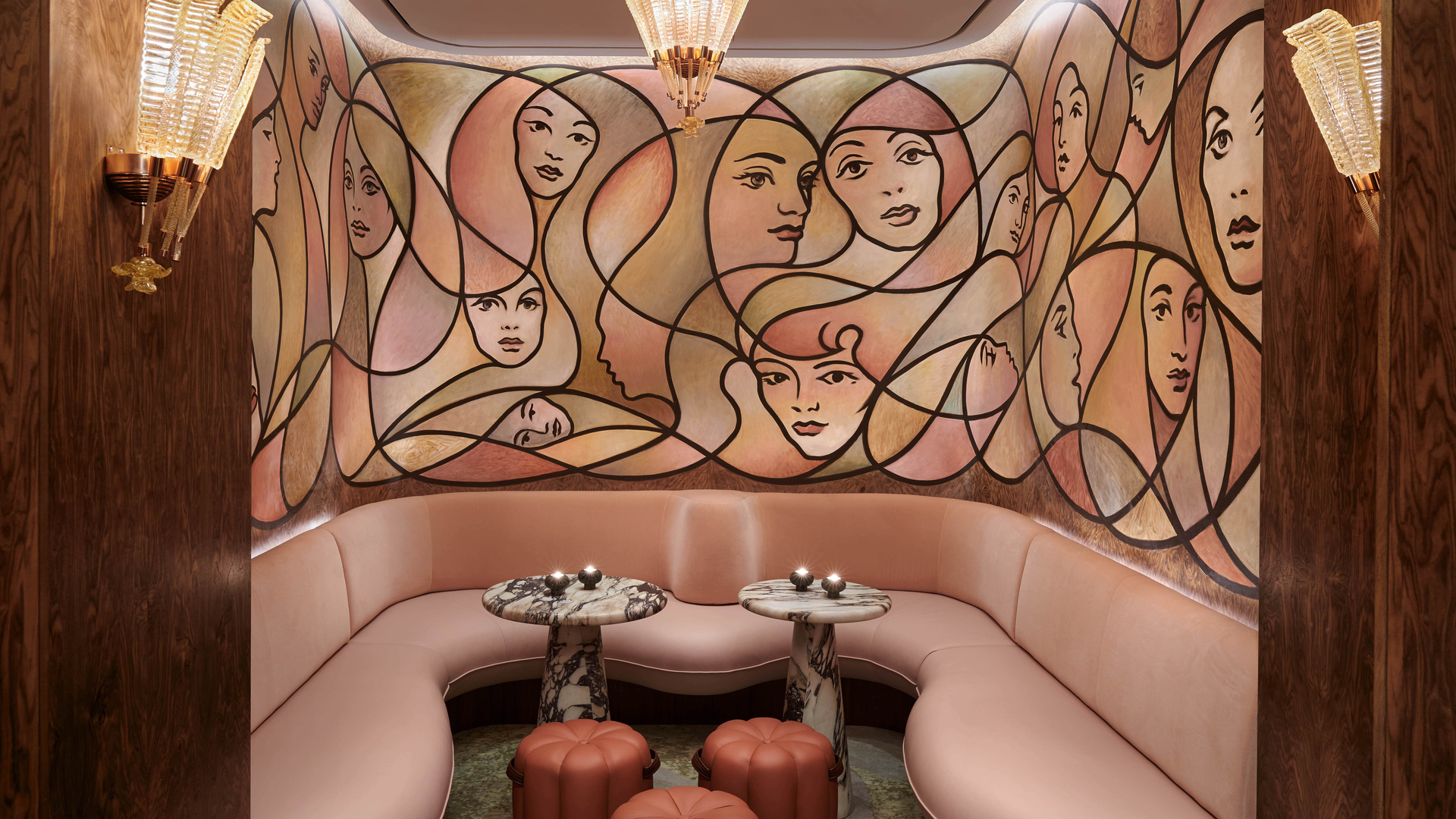 A chic rooftop poolside setting with striped loungers, lush plants, and a stylish bar area. Overlooking the cityscape, this serene retreat offers a refined ambiance for relaxation and socializing.